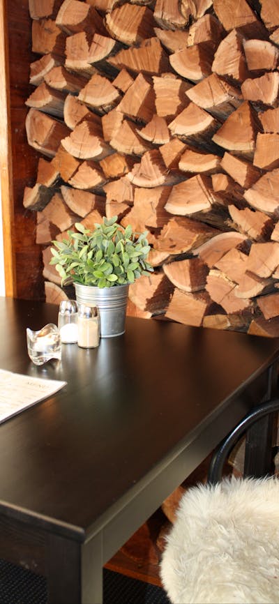 Wood pile near table