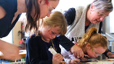 Visitors during tile making class