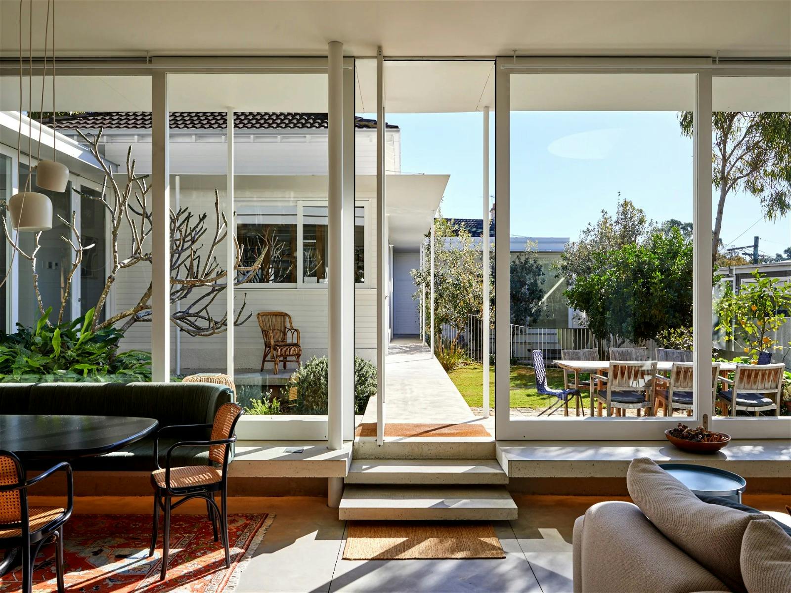 Outdoo dining with lush greenery views