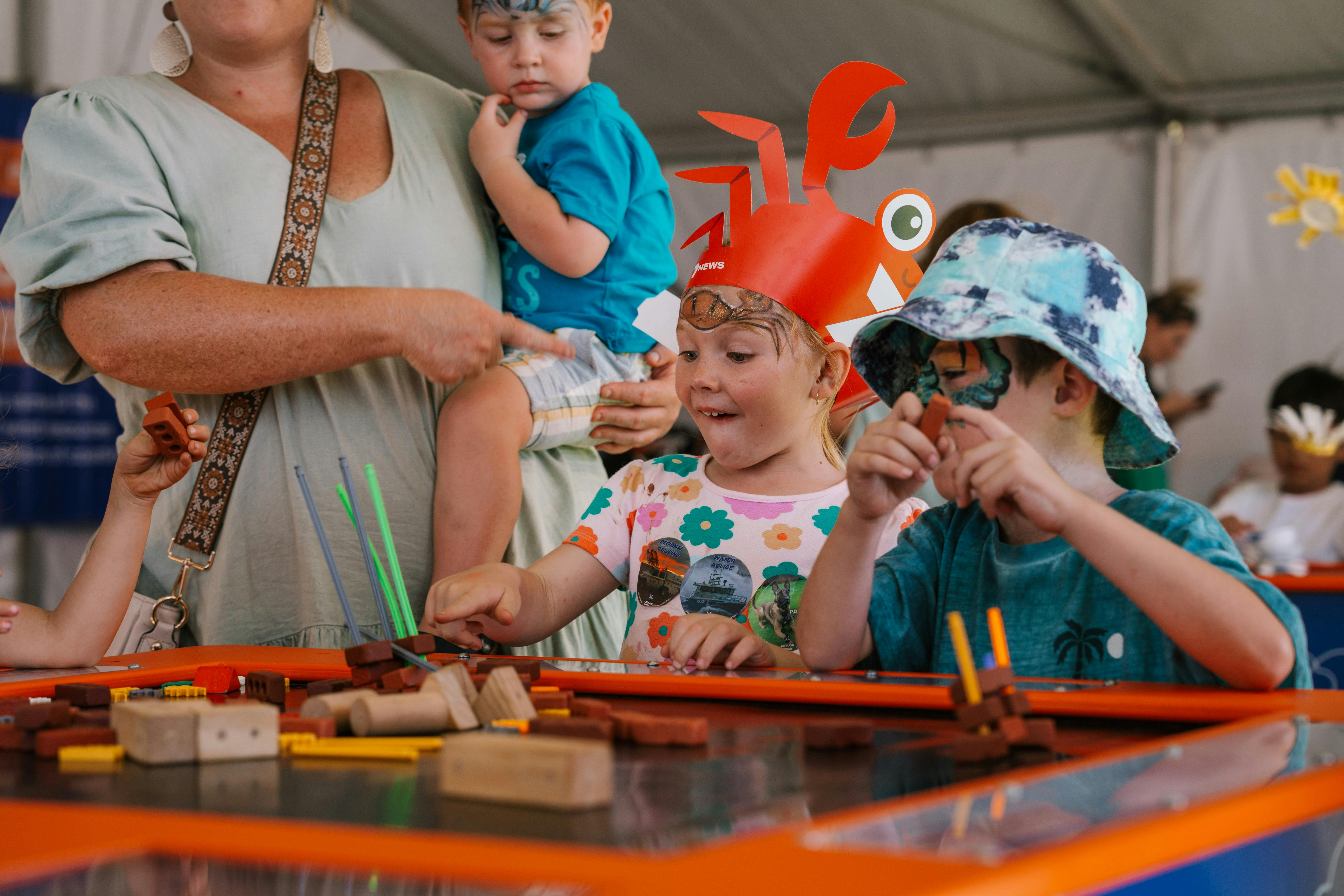 Kids enjoying free activities at crab fest