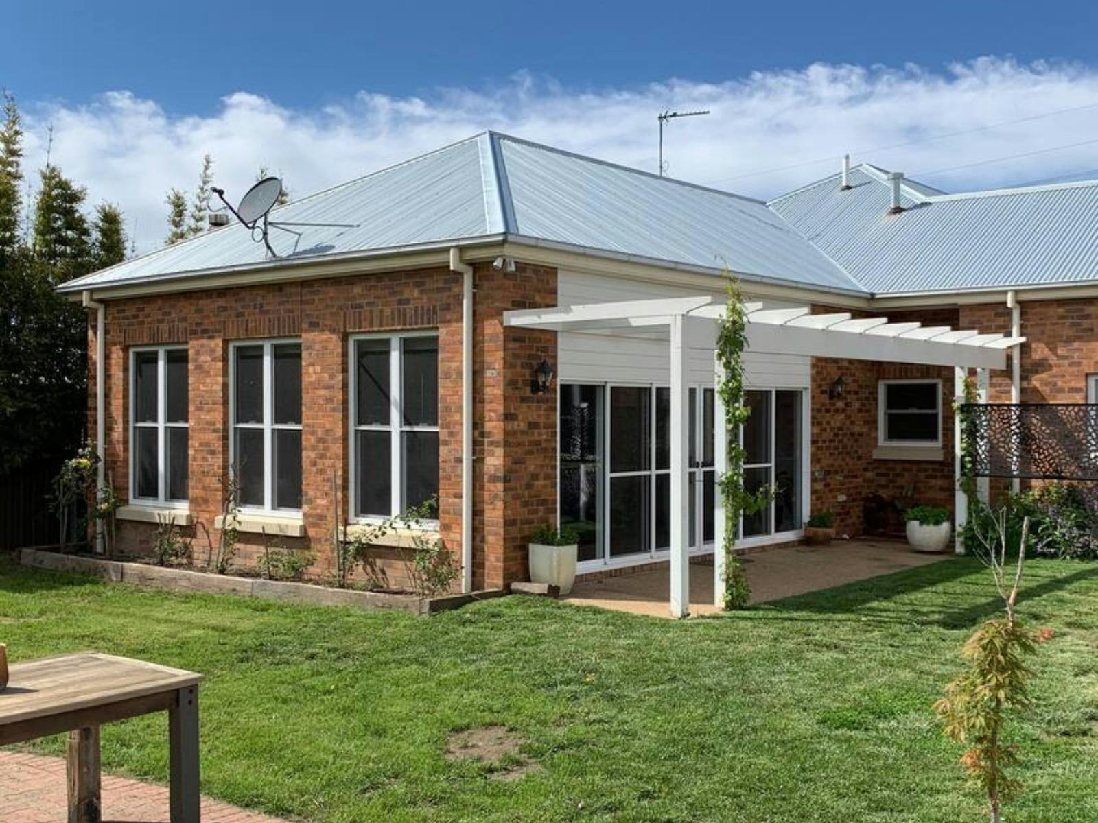 Perfect outdoor setting, with outdoor furniture and bbq.