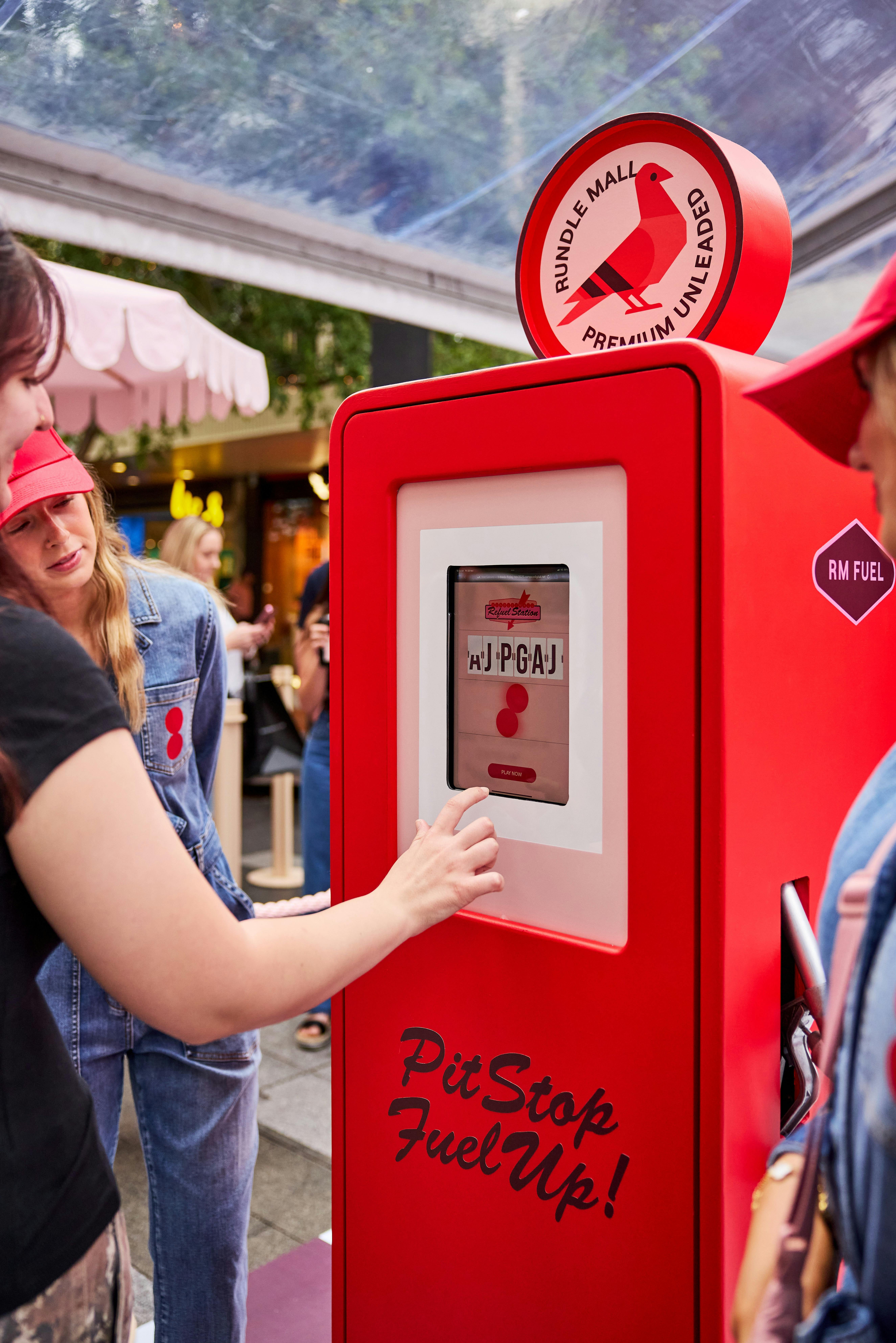 Rundle Mall Refuel Station gas pump with someone seeing if they have won