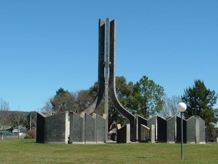 concrete structure with spire at centre