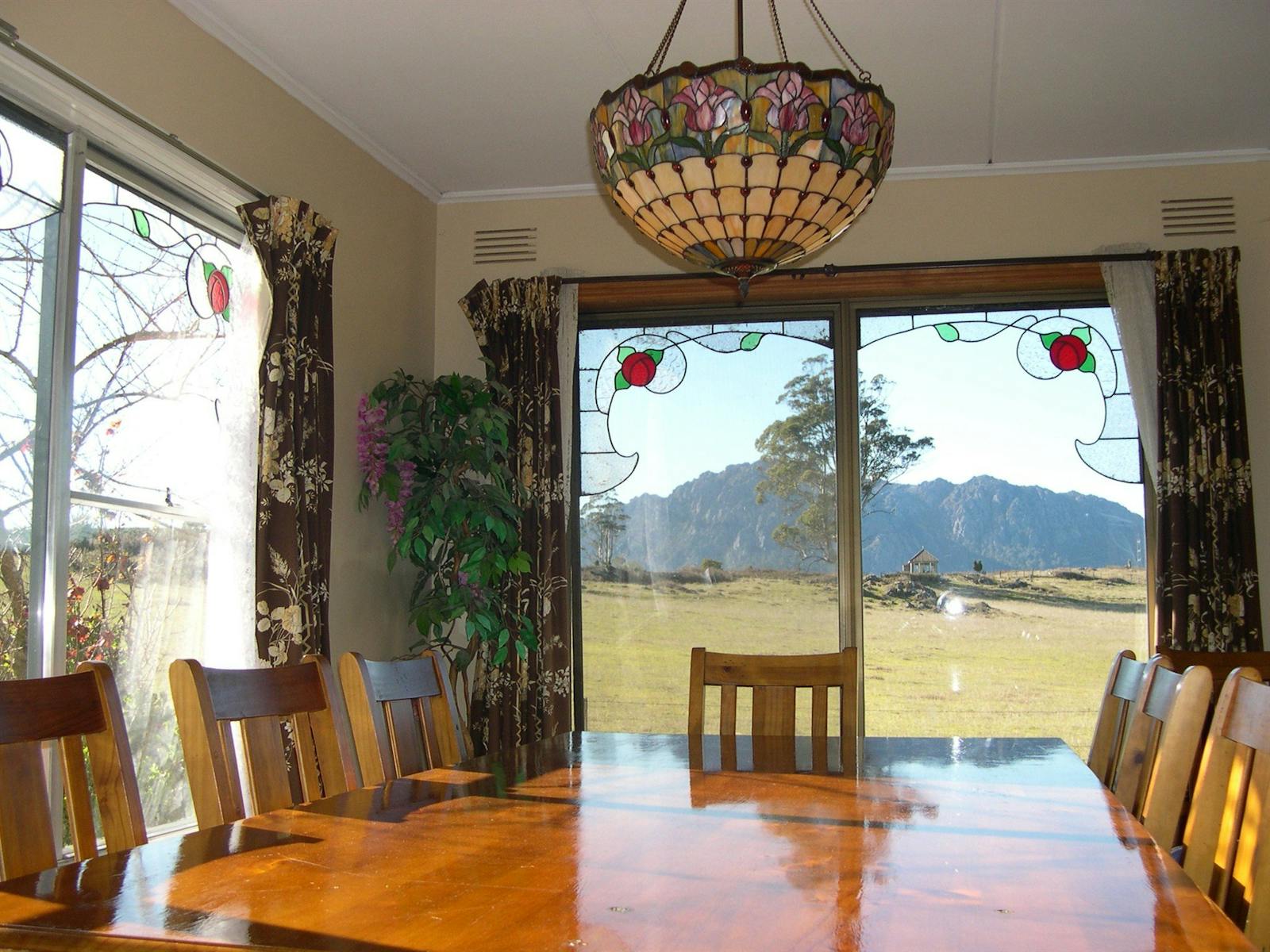 Dining rooms with Stained glass & great views