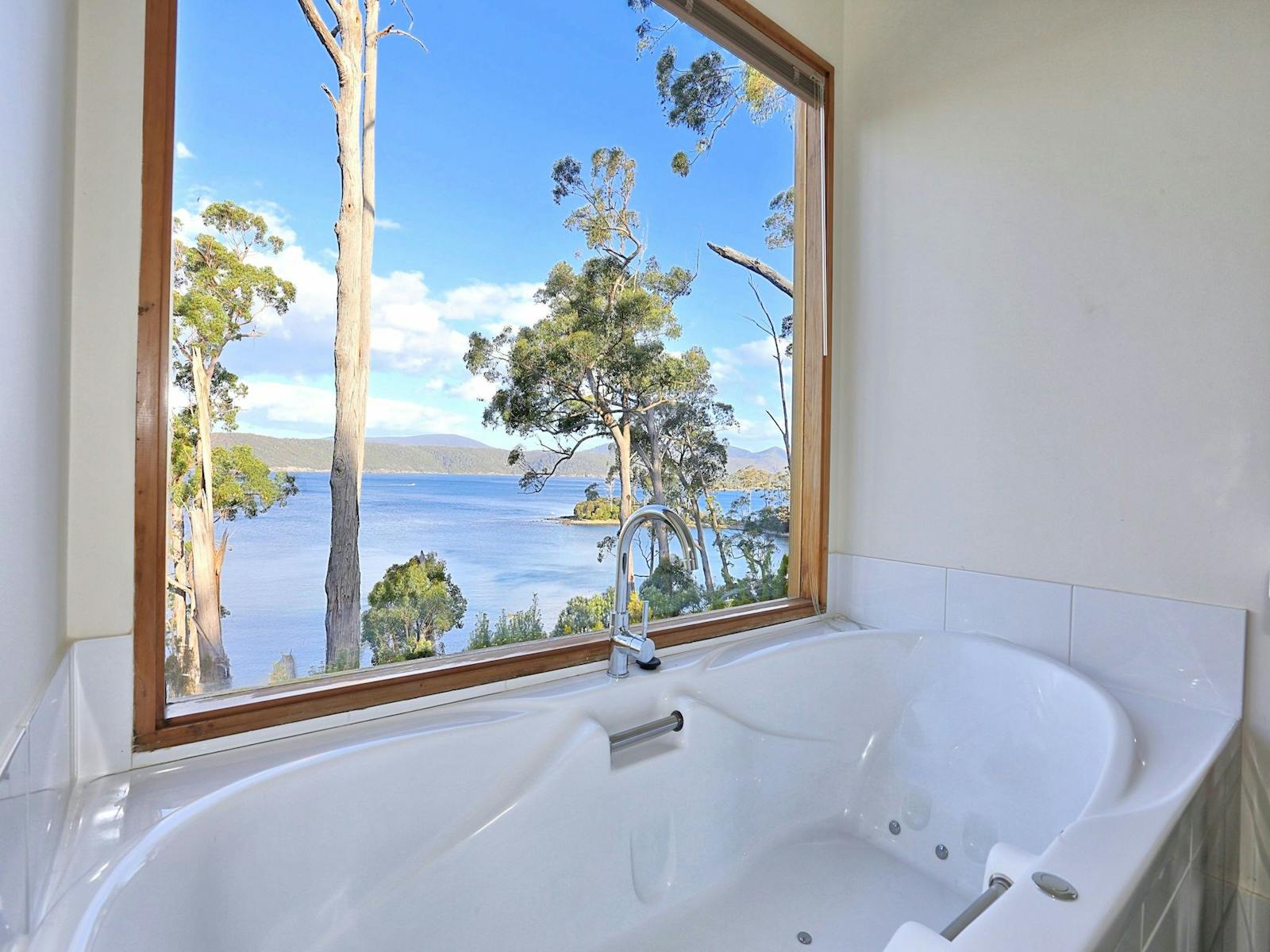 Deluxe Spa Chalet spa bath with views