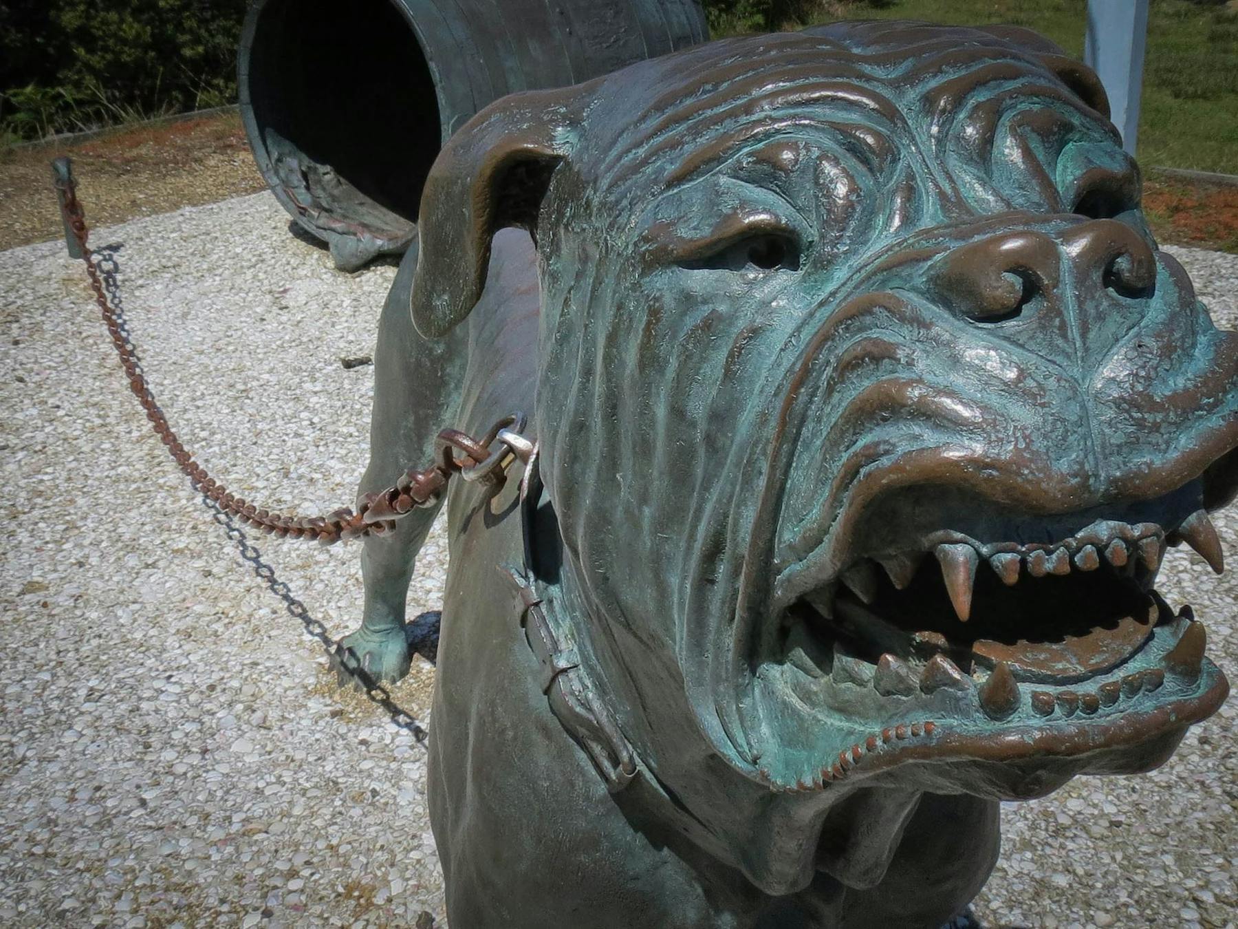 A bronze statue marks the location of the dog line at Eaglehawk Neck