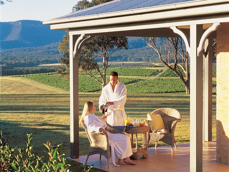 Sitting on the verandah outside a 2 bedroom Lodge