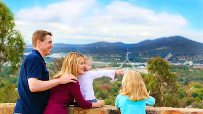 Family looking over Canberra from Red Hill Lookout