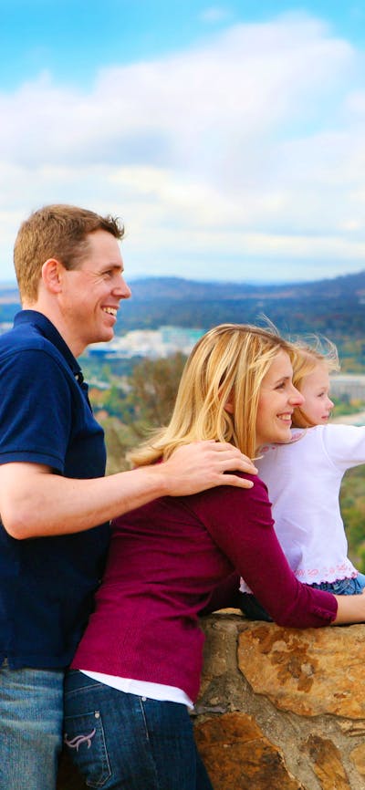 Family looking over Canberra from Red Hill Lookout