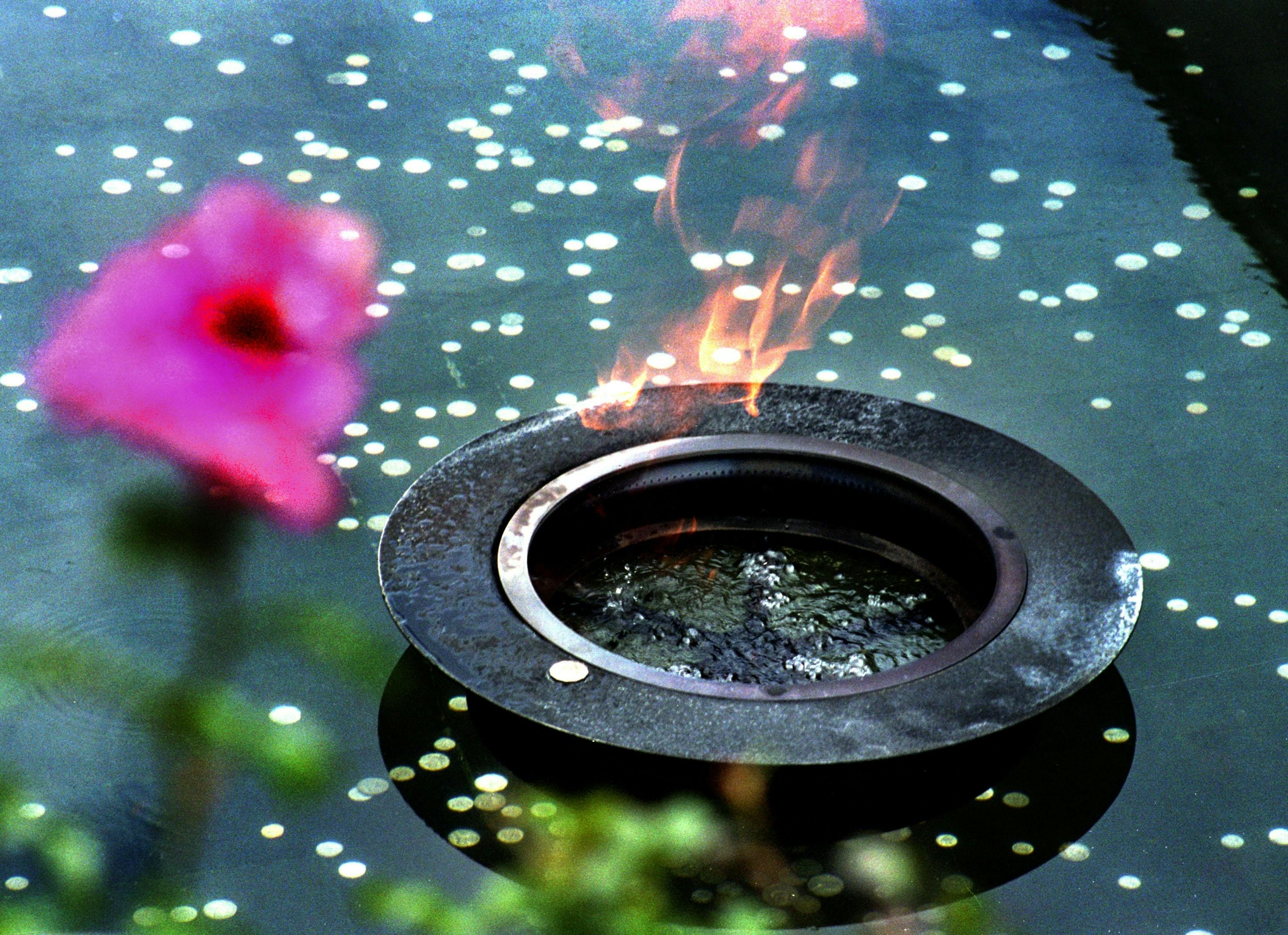 Eternal flame in the Pool of Reflection at the Australian War Memorial