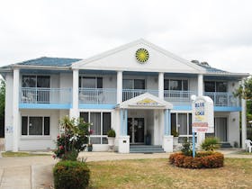 Blue and White Lodge exterior view from road