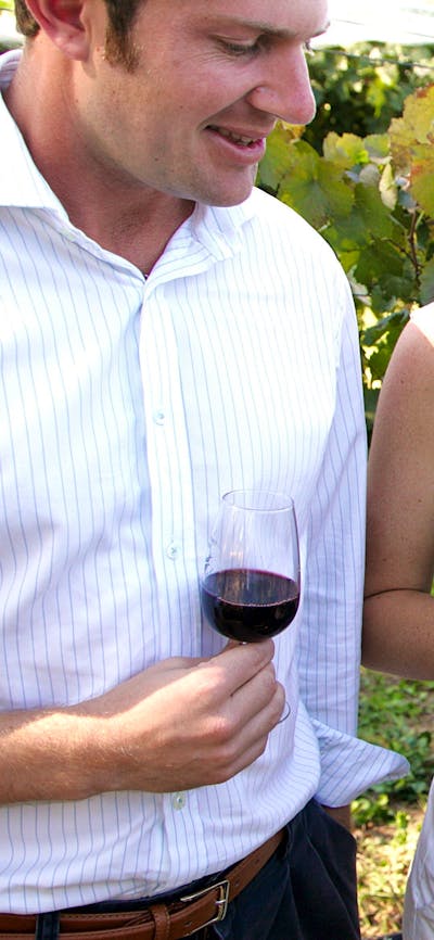 Couple learning about the grapes from vintner Allan Pankhurst