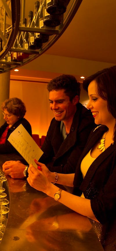 Couple ordering drinks from the Prosecco Bar