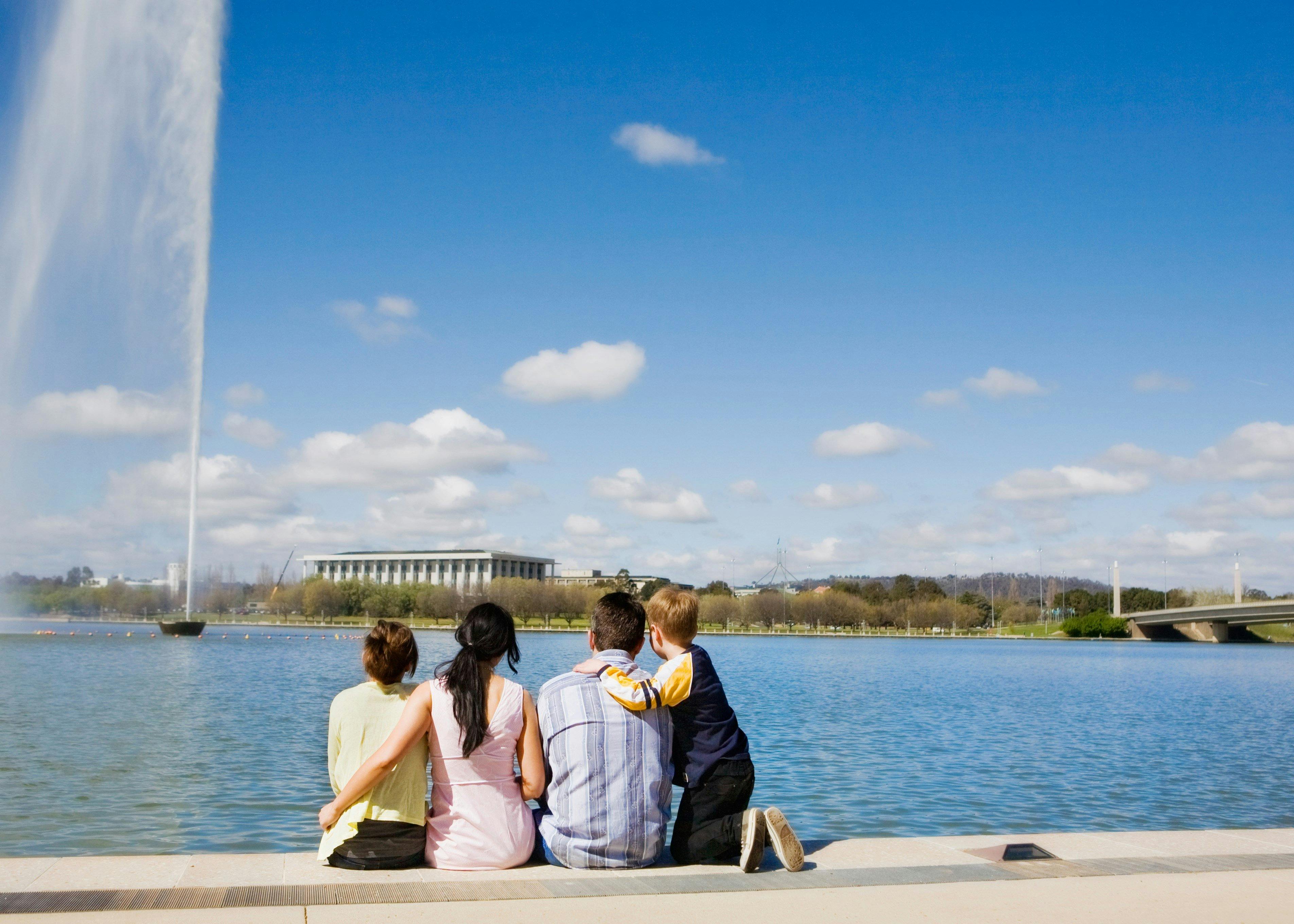 Family viewing Captain Cook Memorial Jet from the RG Menzies Walk in Canberra.
