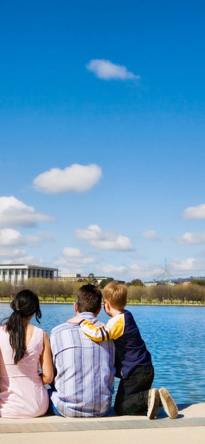 Family viewing Captain Cook Memorial Jet from the RG Menzies Walk in Canberra.