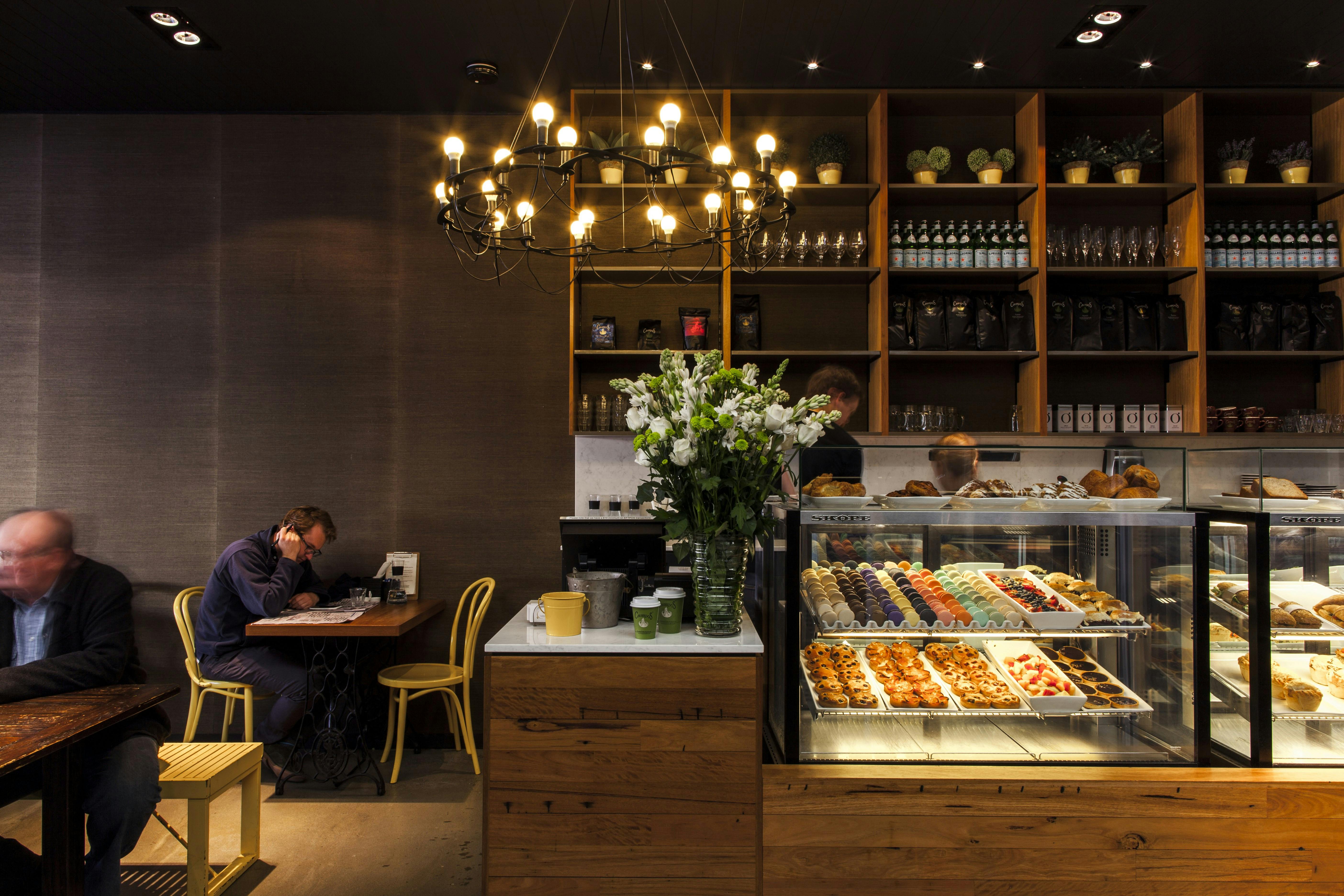 Cafe interior with cake displays