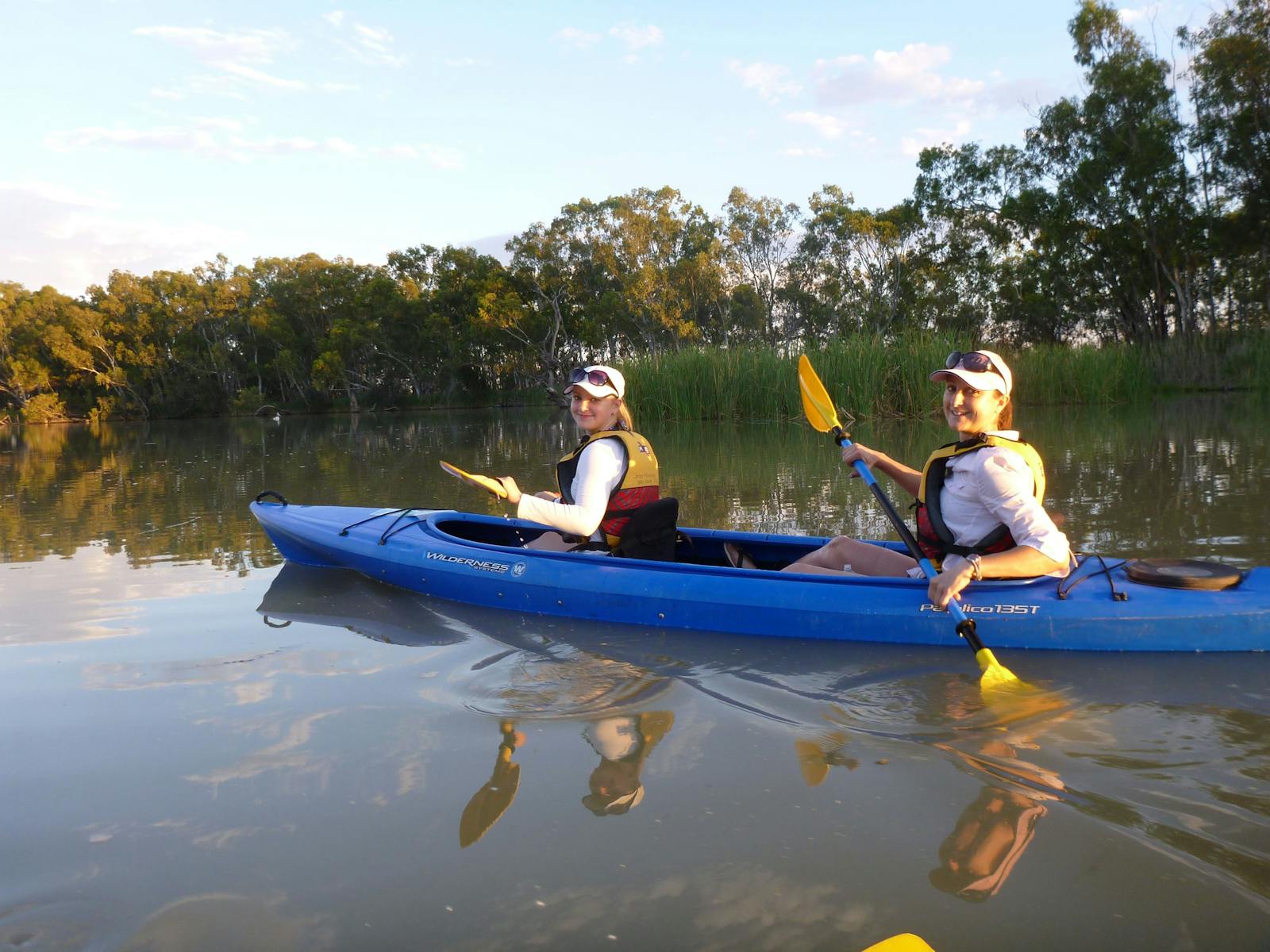 Mother and Duaghter paddling along Gurra Creek in a double kayak