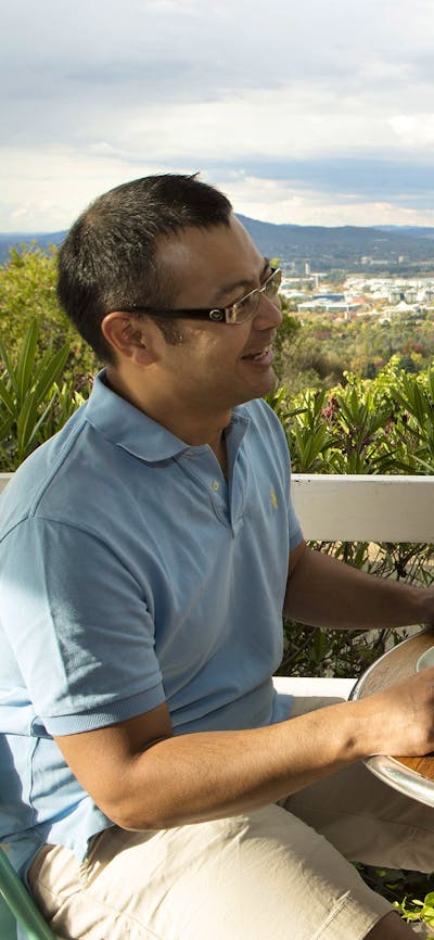 Couple eating outside with great views