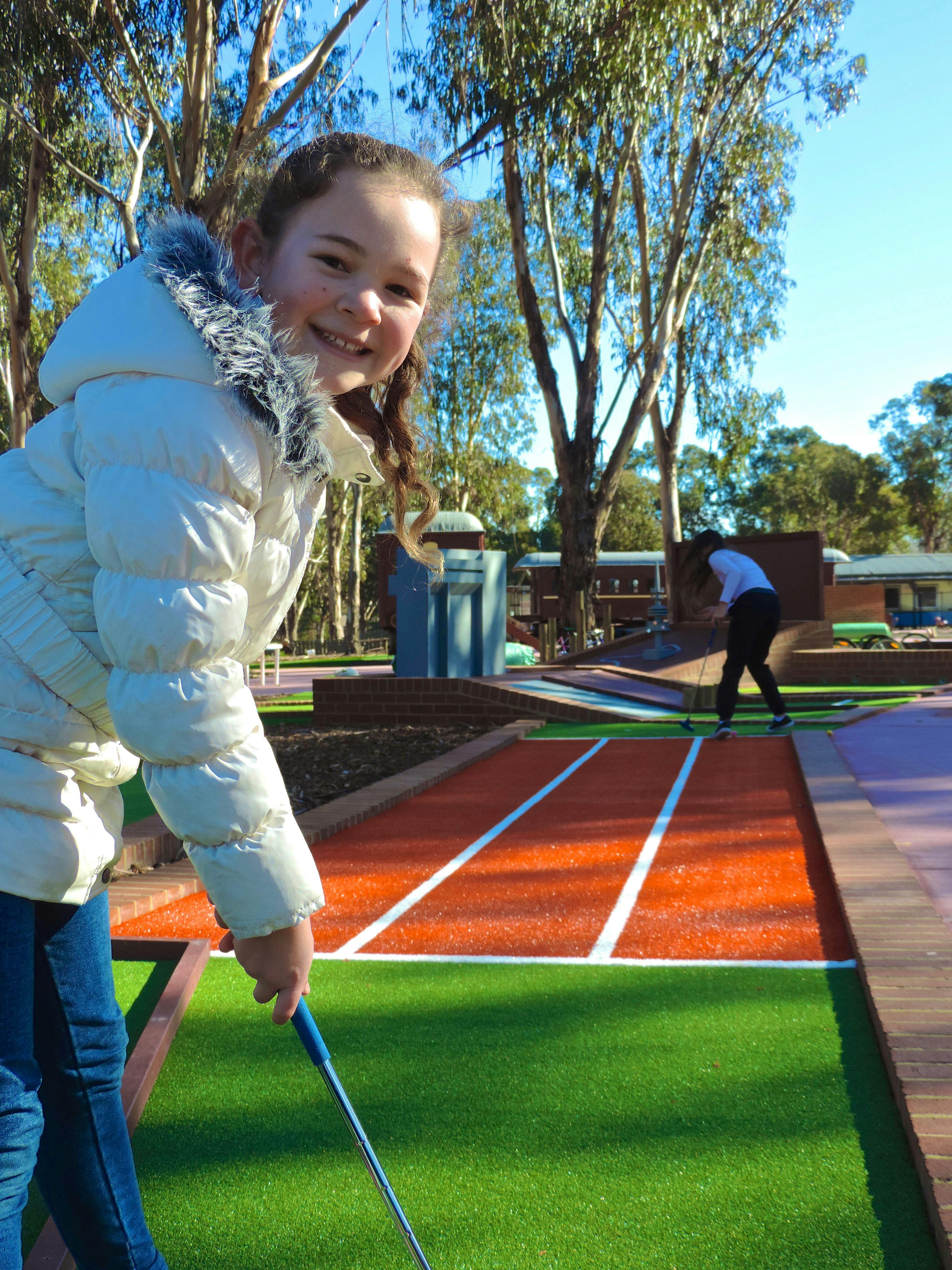 Children on the miniature golf course