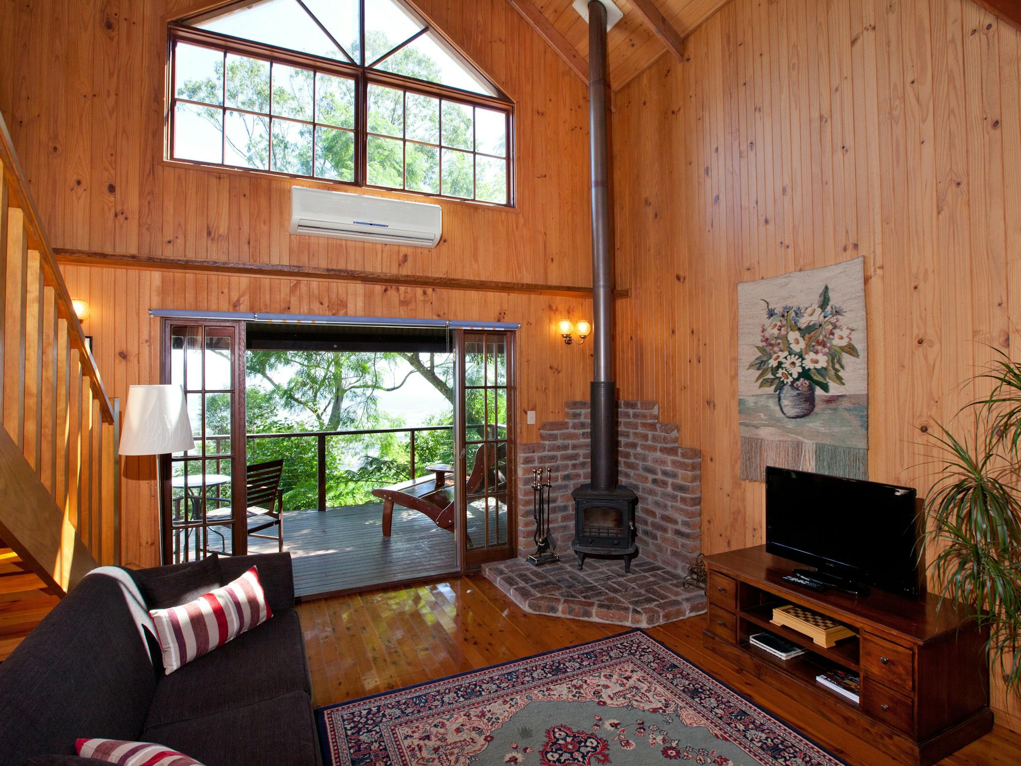 Lounge area in Chalet with Balcony Lounge area in Chalet with Balcony