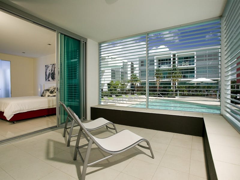 Balcony of a one bedroom apartment overlooking the pool Balcony of a one bedroom apartment overlooking the pool