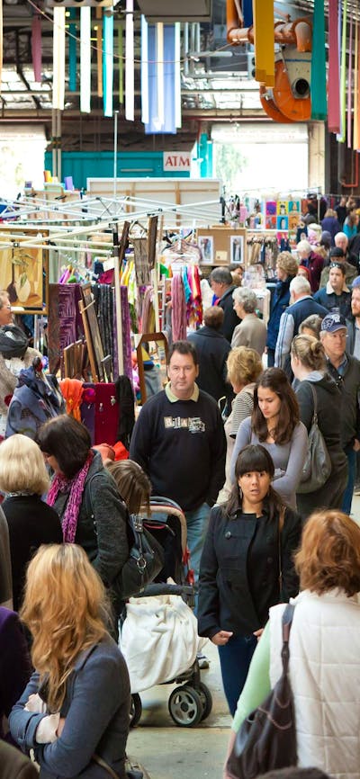 The hustle and bustle of visitors of stallholders at the Old Bus Depot Markets