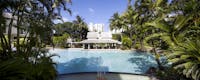 Lagoon Style Pool with swim up pool bar.