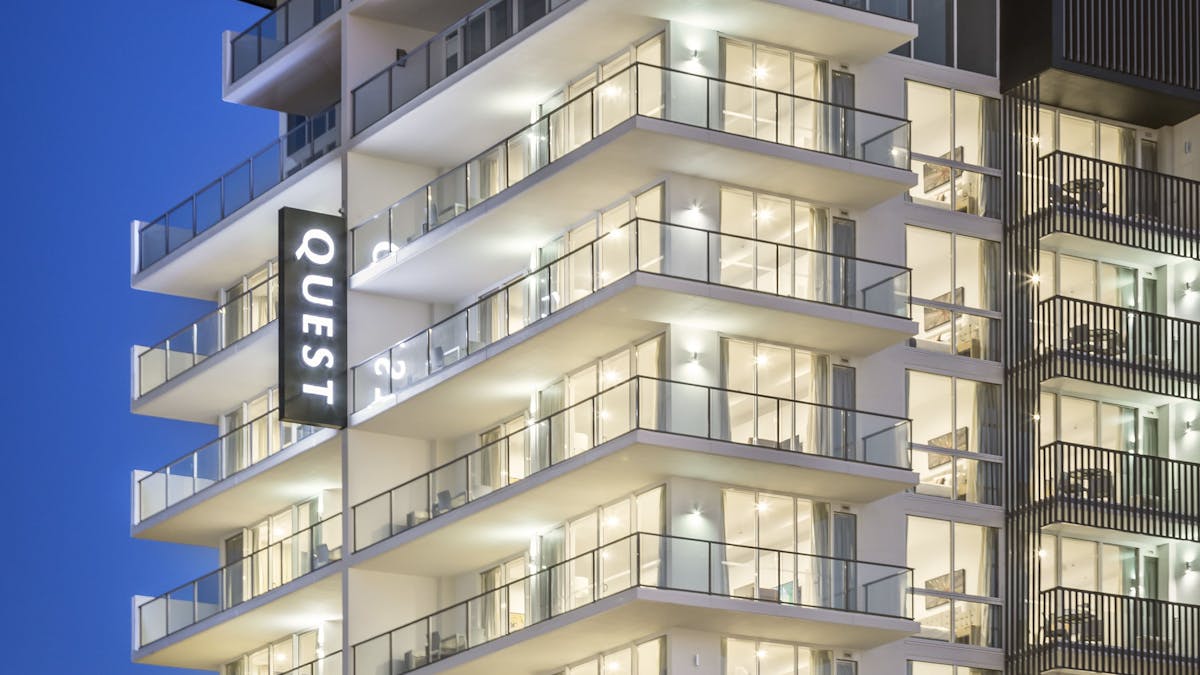 Modern 10 level hotel exterior with a welcoming entrance.
