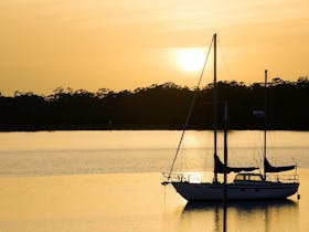 Yacht moored at Metung at sunset
