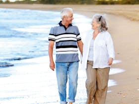 Leisurely stroll along Moore Park Beach