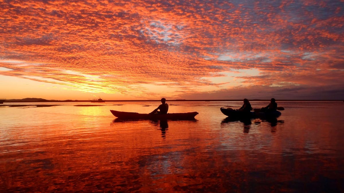 Kayaking at sunset in 1770