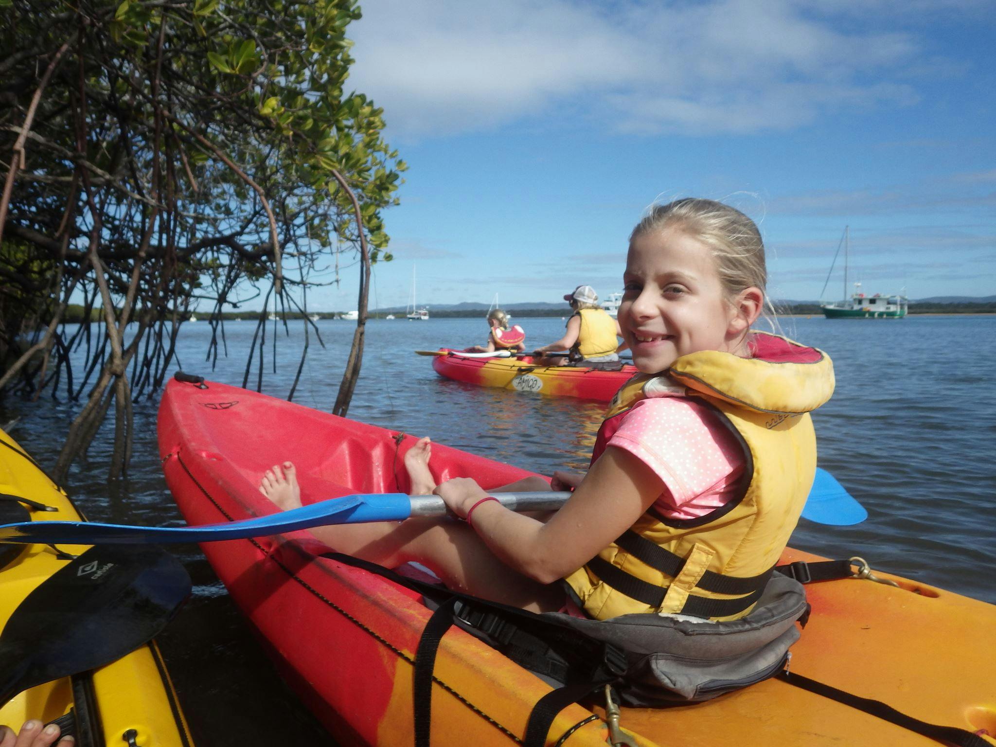 Family friendly kaKids enjoying the kayak tour with 1770 Liquid Adventuresyaking tour in 1770