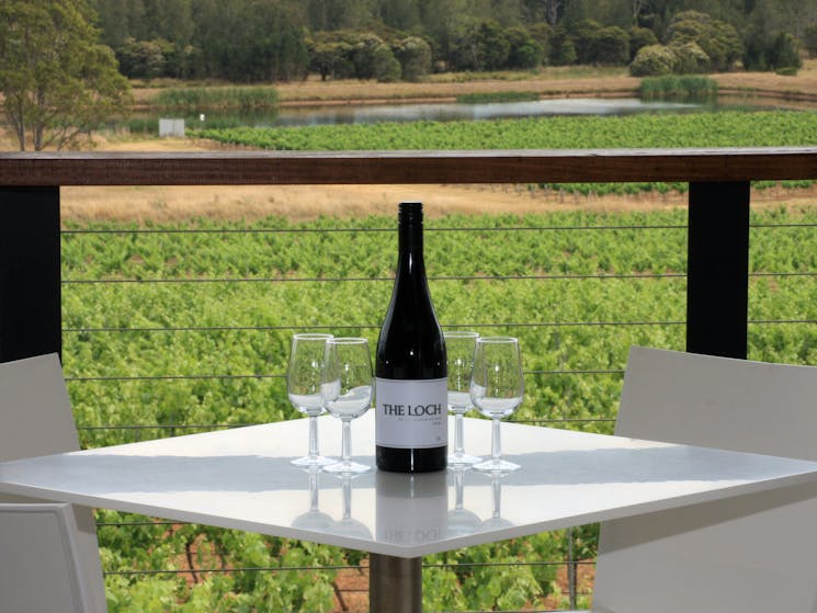 Enjoy a glass of the Loch Shiraz overlooking the vineyards