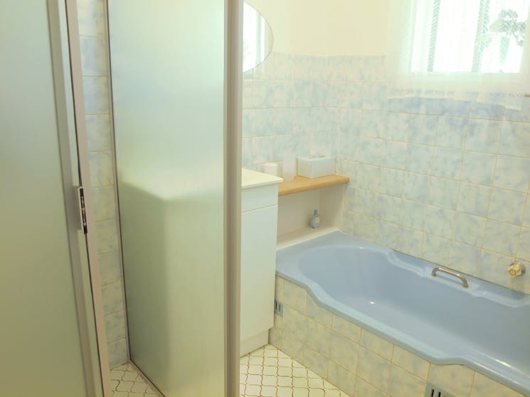 Cottonwood Cottage bathroom with shower, bath and vanity