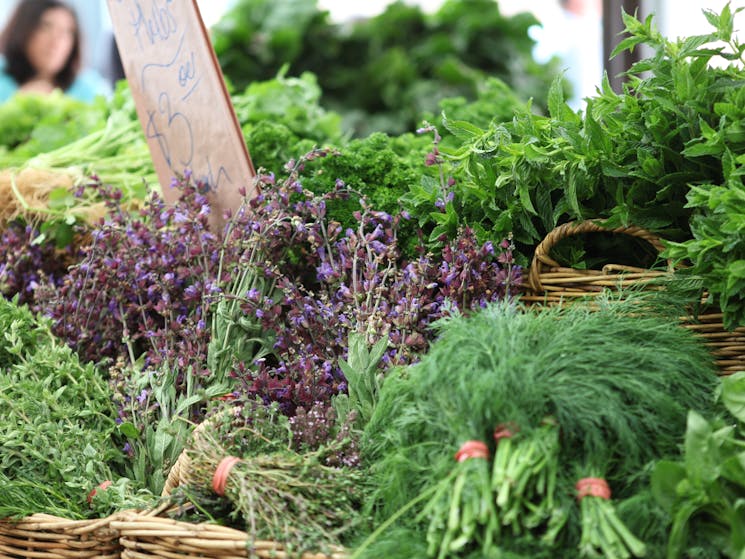 Fresh seasonal herbs and greens at Carriageworks Farmers Market