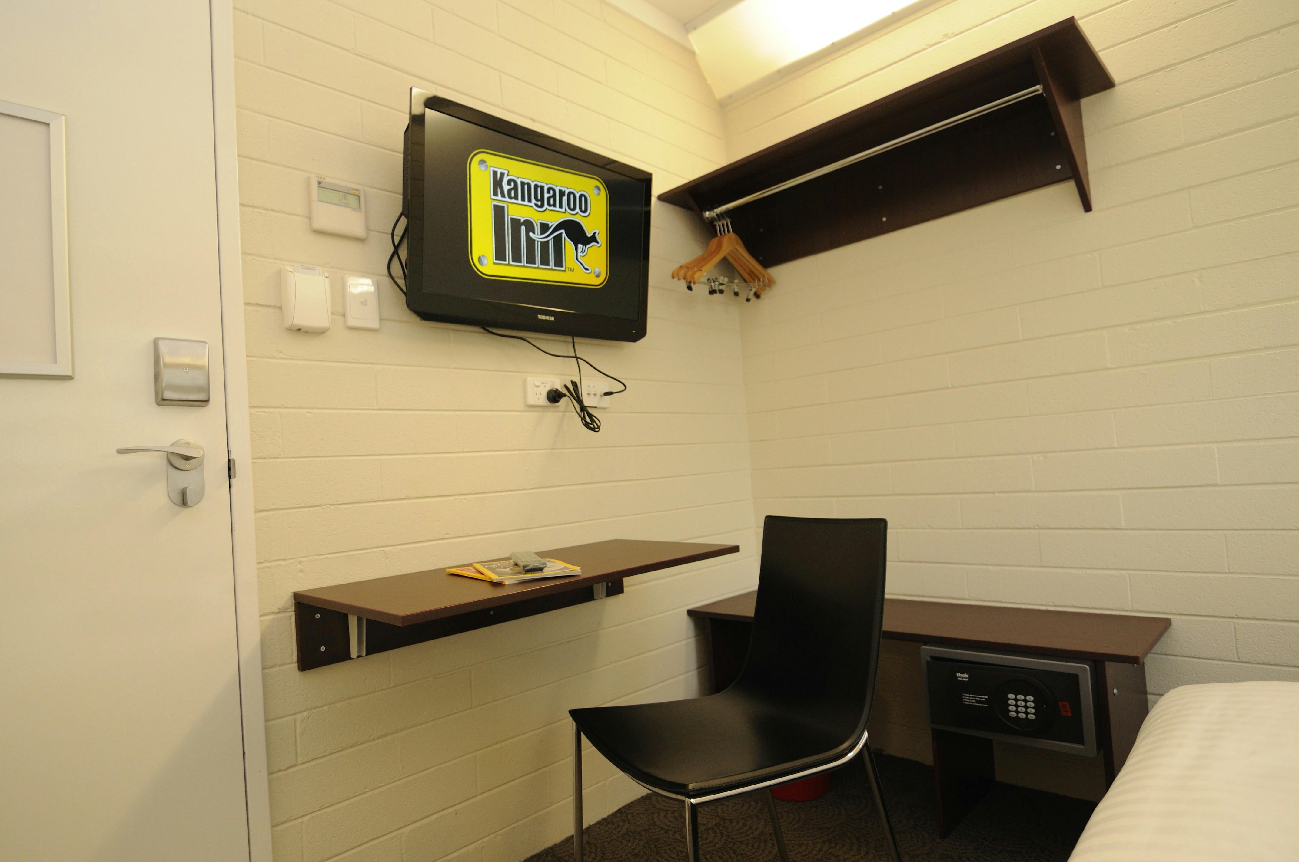 Queen Room with 32 inch television, in-room safe, folding desk and chair