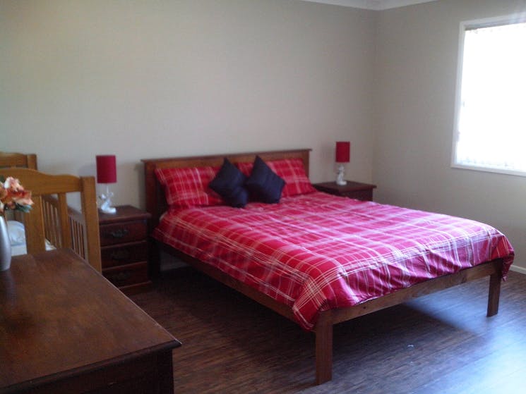 Main bedroom with cot.