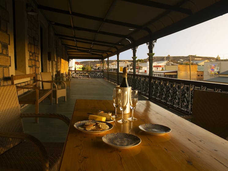 Enjoy a drink or watch the sunset from the huge veranda.