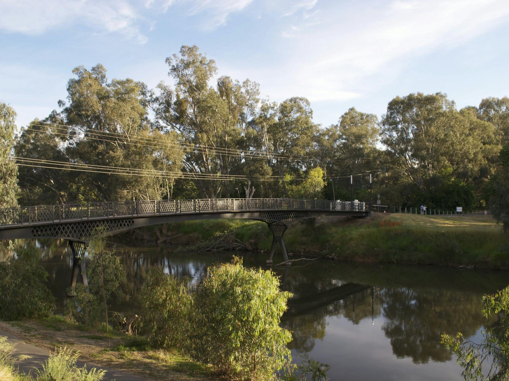 A two minute walk over the footbridge to town