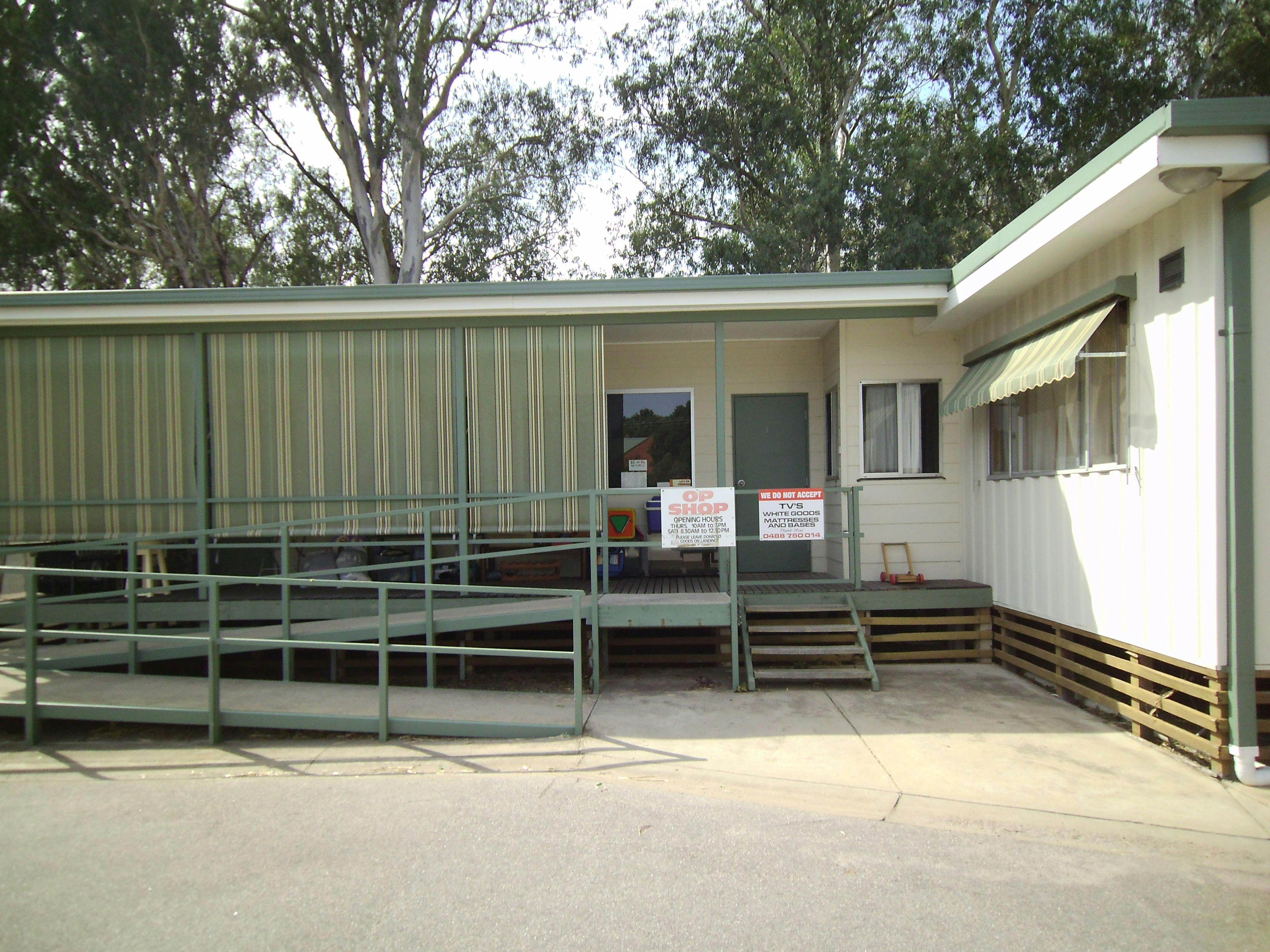 building with ramp and steps varanderah blinds and entry to Opportunity Shop