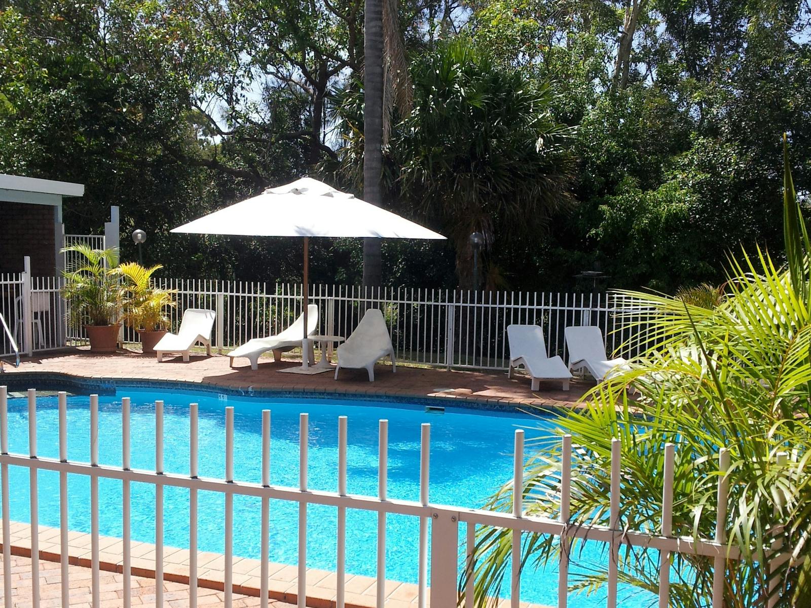 The saltwater pool is adjacent to the garden area where you can feed wild lorikeets daily.