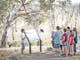 Reading interpretive signs around the Winton Wetlands