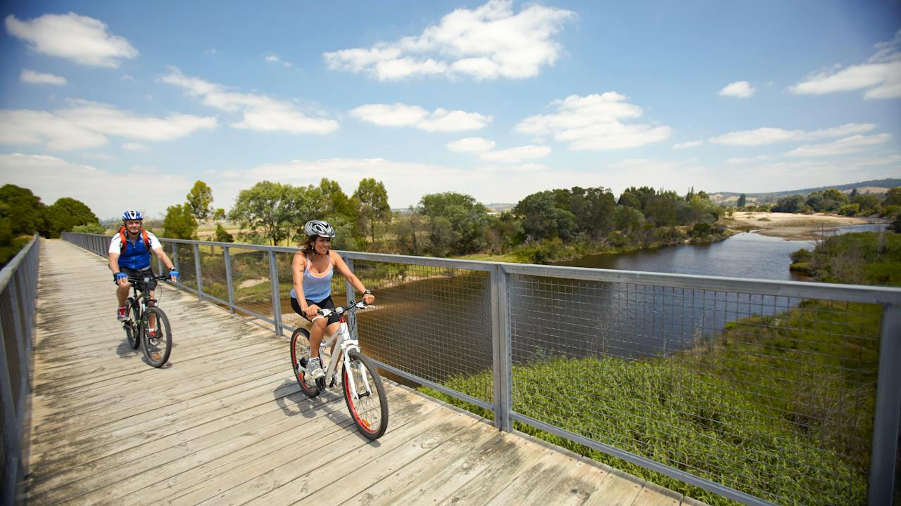 Cycling the East Gippsland Rail Trail near Bruthen, Gippsland, Victoria, Australia