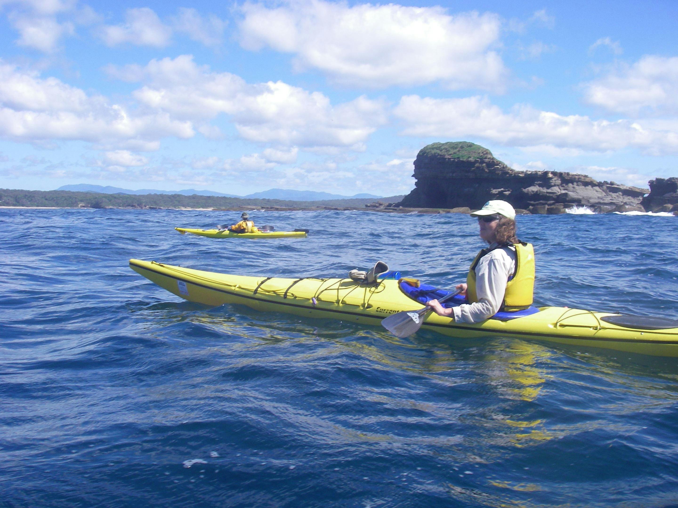Paddling along the coastline of Murramurang National Park
