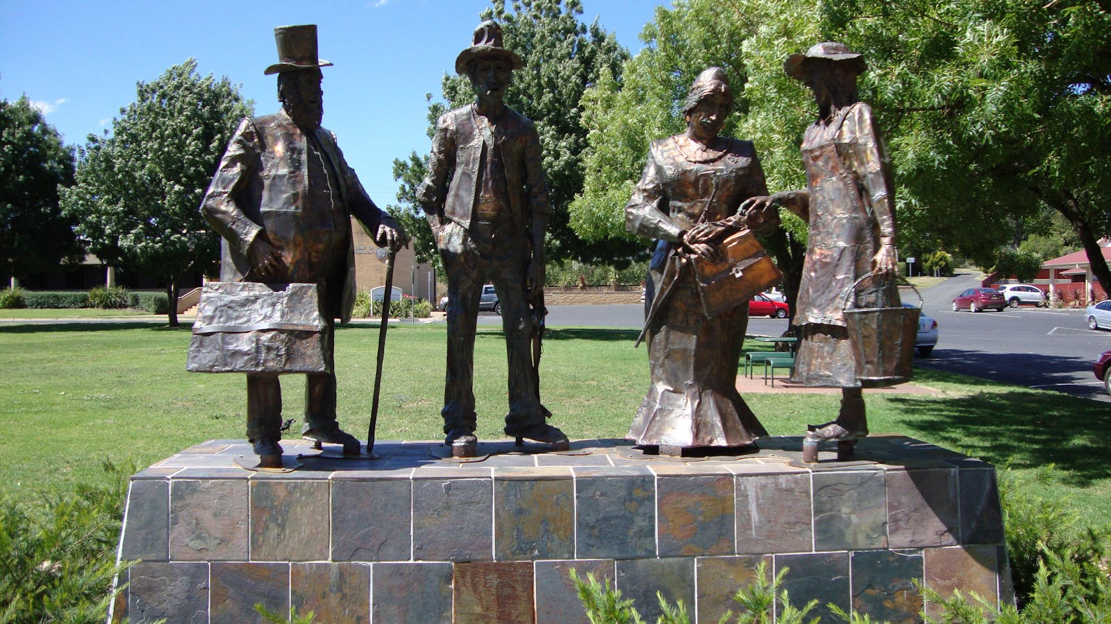 Dad, Dave, Mum and Mabel Statues