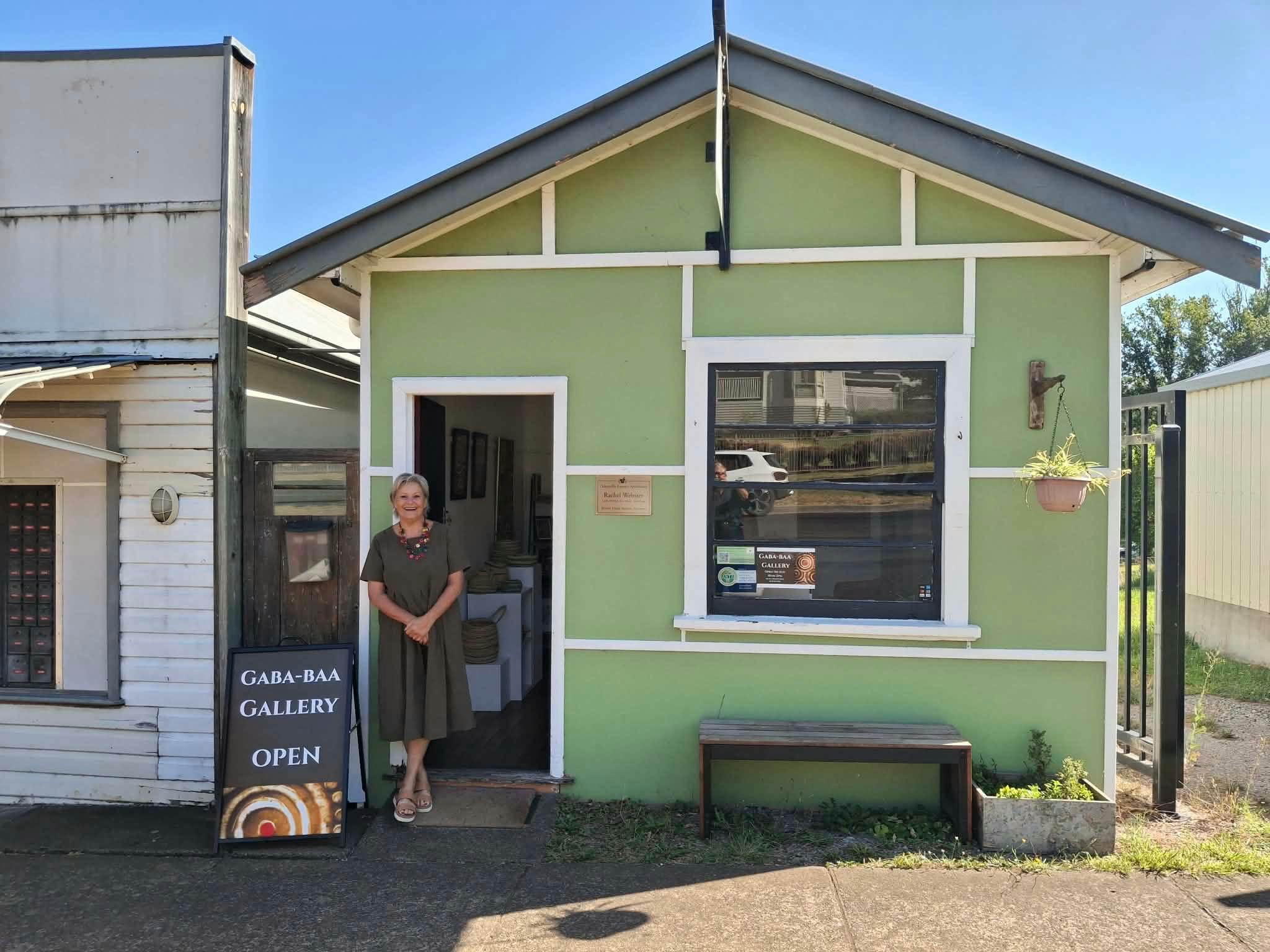 Debbie Taylor-Worley standing in the doorway of Gaba-baa Gallery