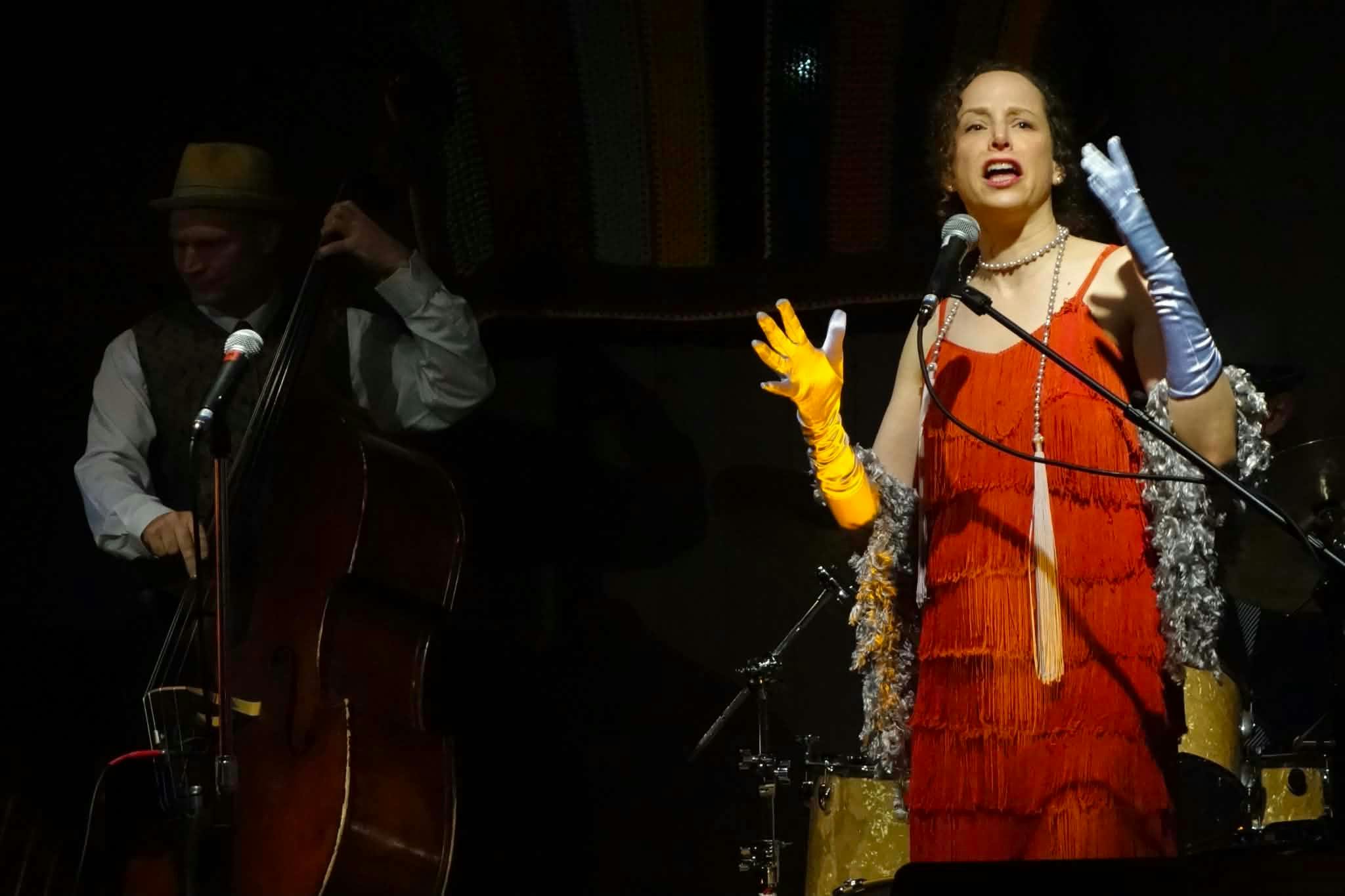 Singer in fringe dress