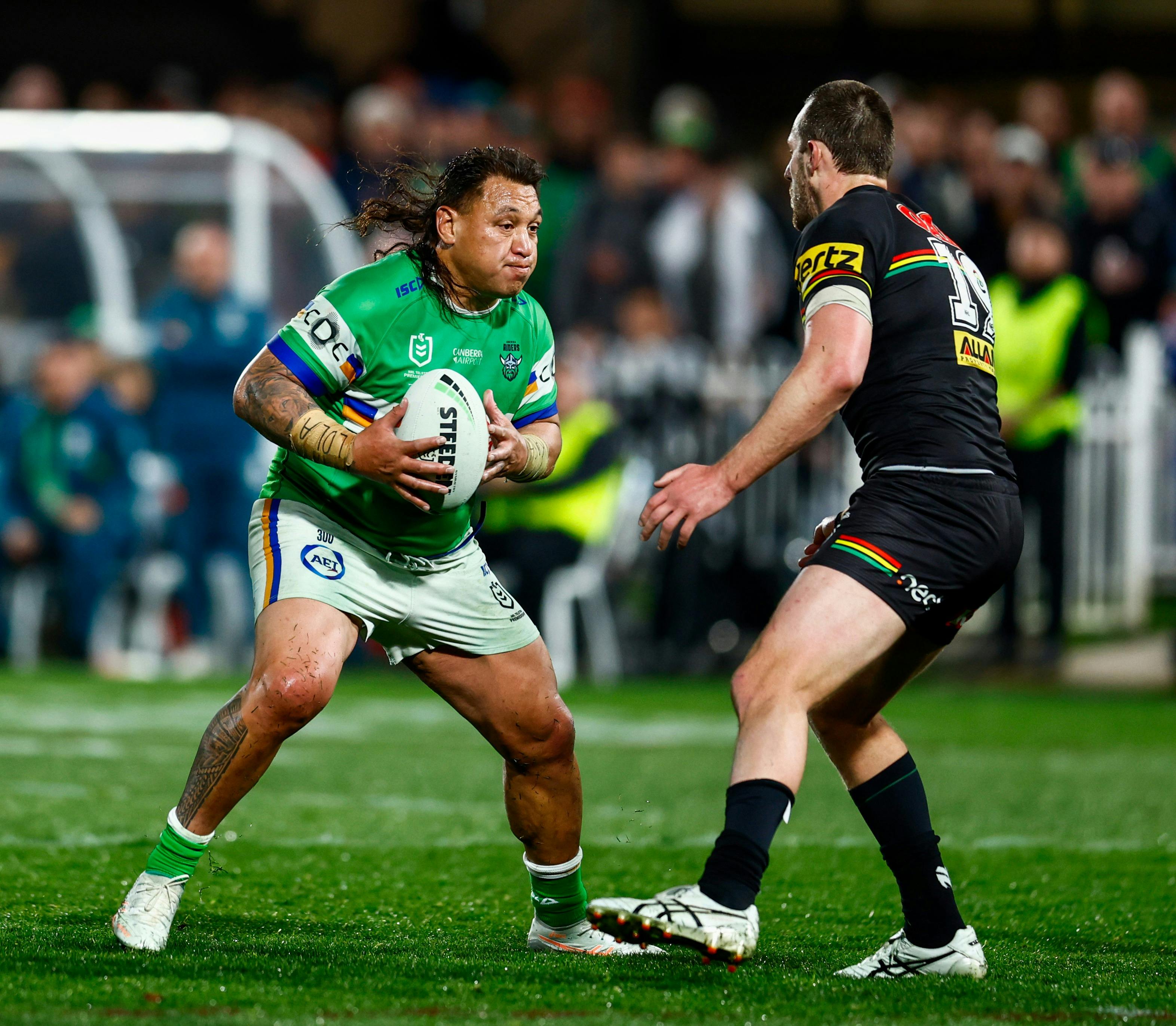 Canberra Raiders player Josh Papalli'i running the ball.