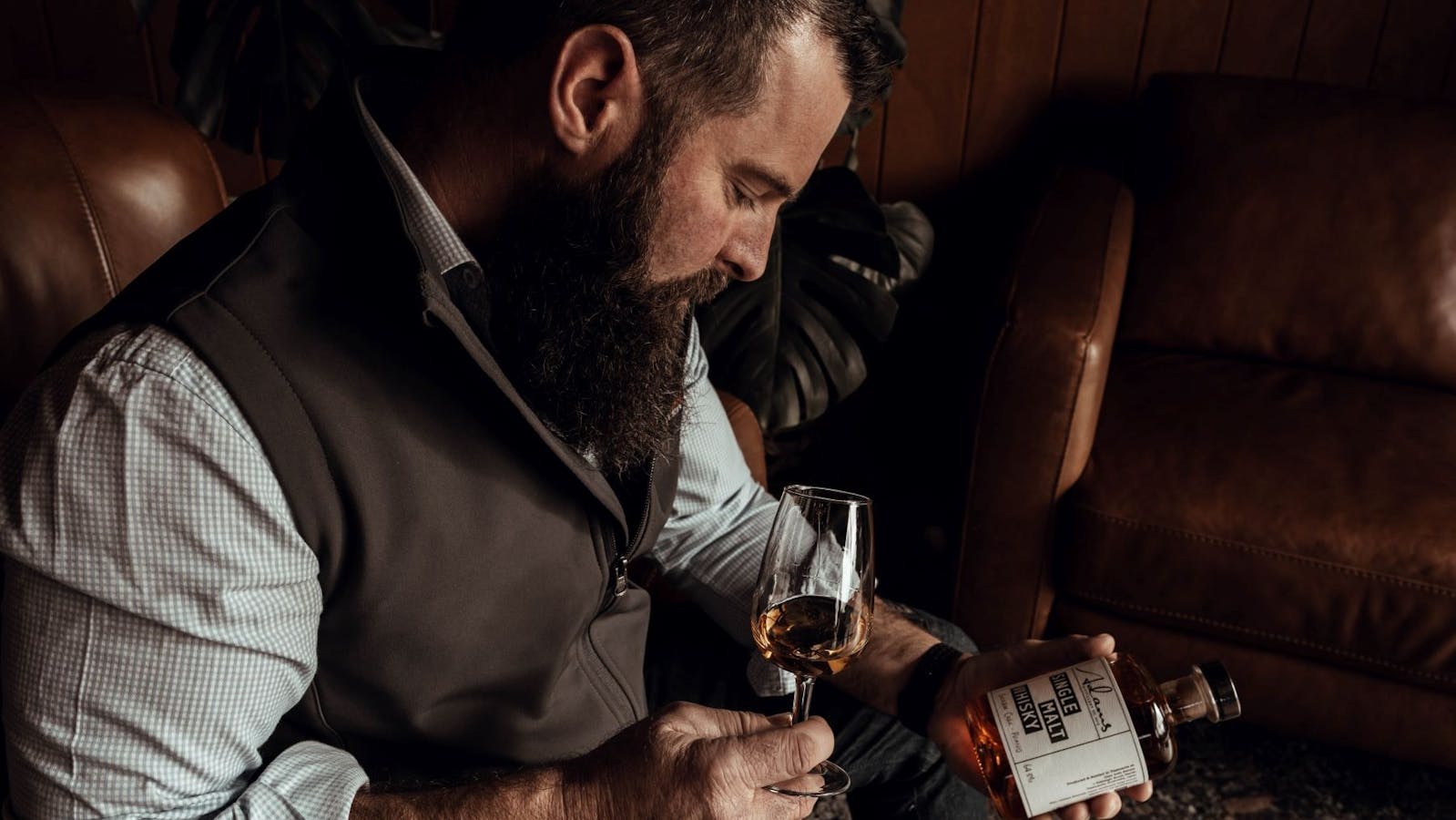 Adam tasting whisky