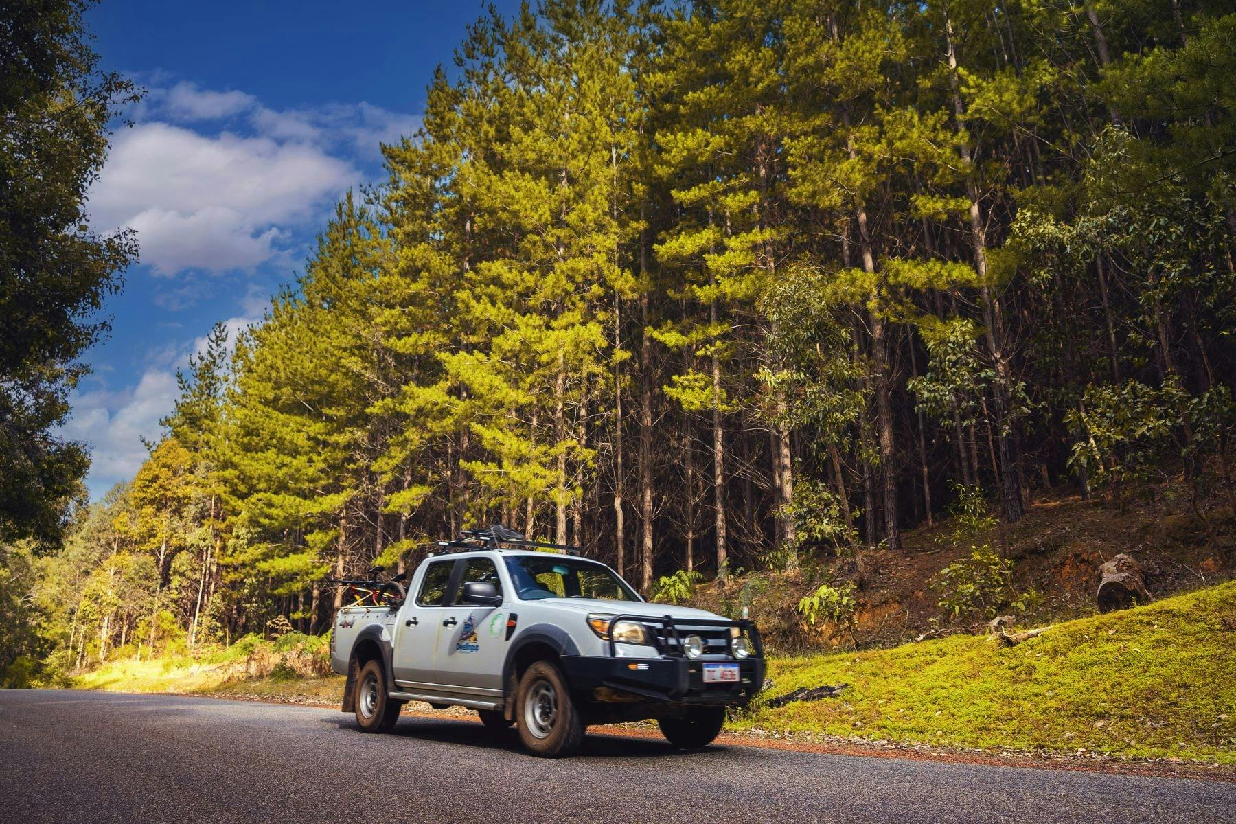 4WD driving on sealed road in Lane Poole Reserve